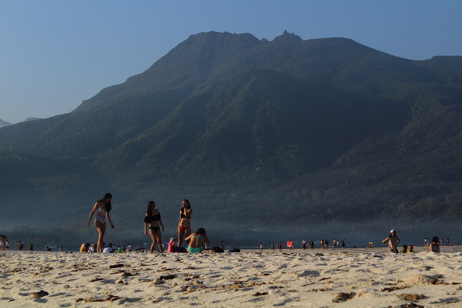 Mount Hibok-Hibok rising above the coast — the volcano whose heat warms Ardent Hot Spring